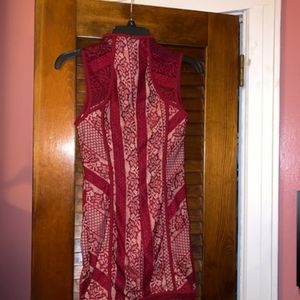 Burgundy mini lace dress.